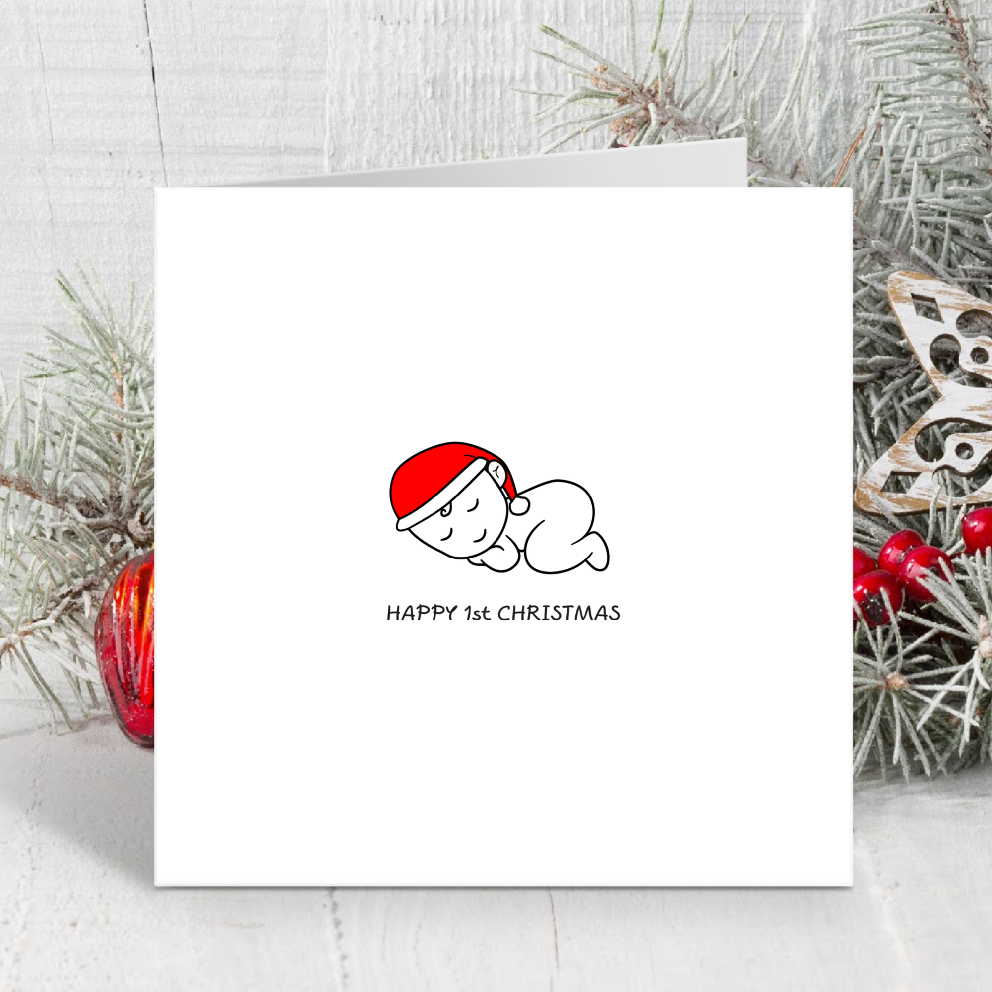 1st Birthday Christmas Card for Baby - Cute Sleeping Baby Wearing a Red Santa Claus Hat - Happy First Xmas